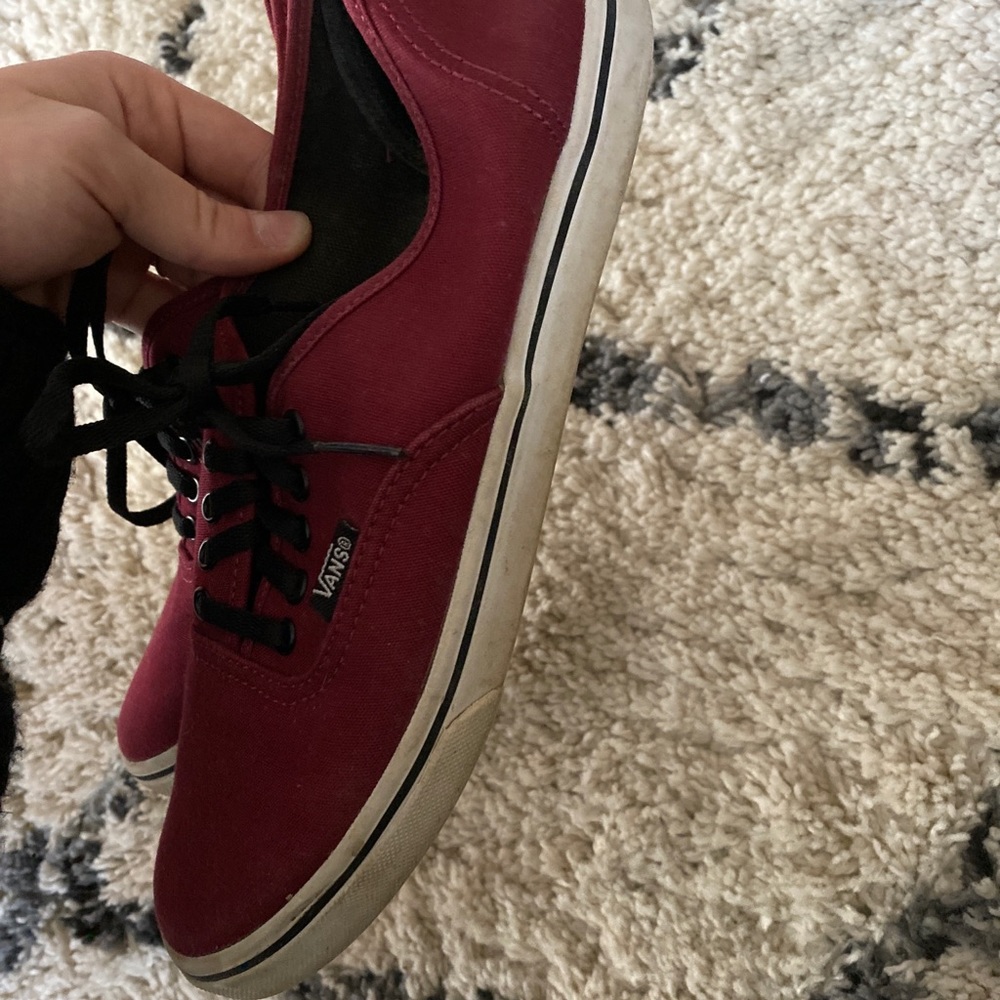 Maroon vans.